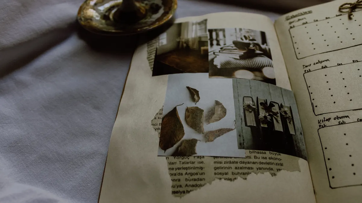 Open scrapbook with photos and layered paper decorations