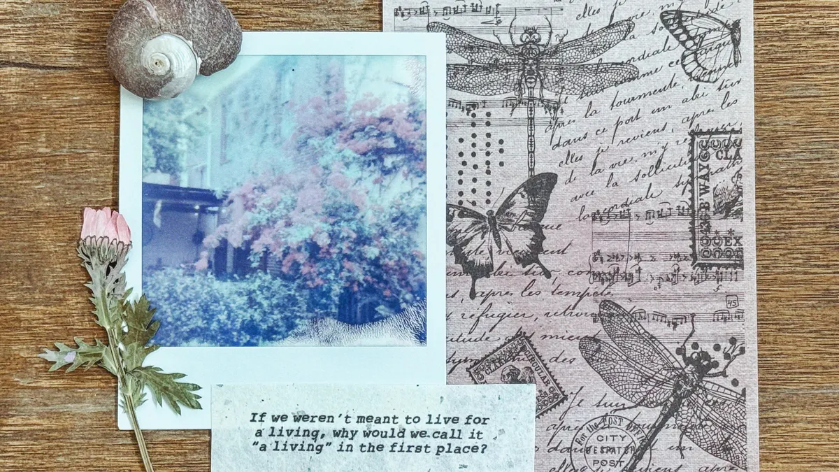 Decorated scrapbook page with photo and butterfly embellishments