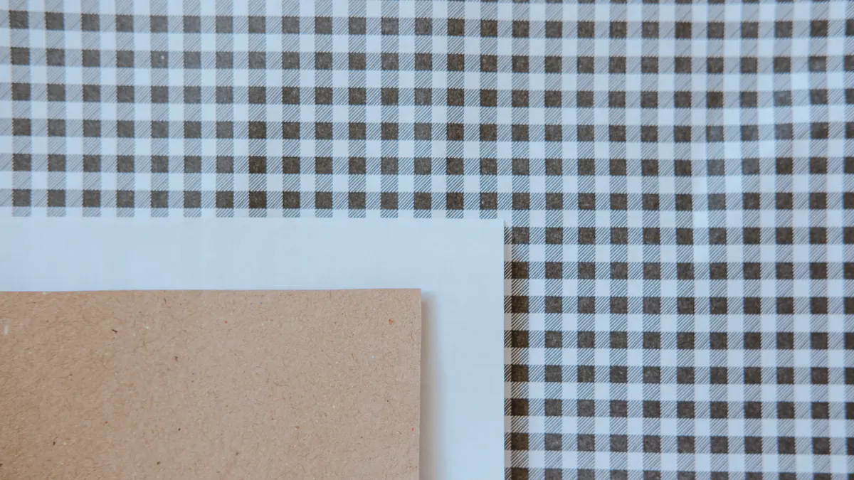 Scrapbooking Paper Types Explained: Cardstock, Patterned Paper, and Specialty Paper Patterned paper beside plain cardstock sheets